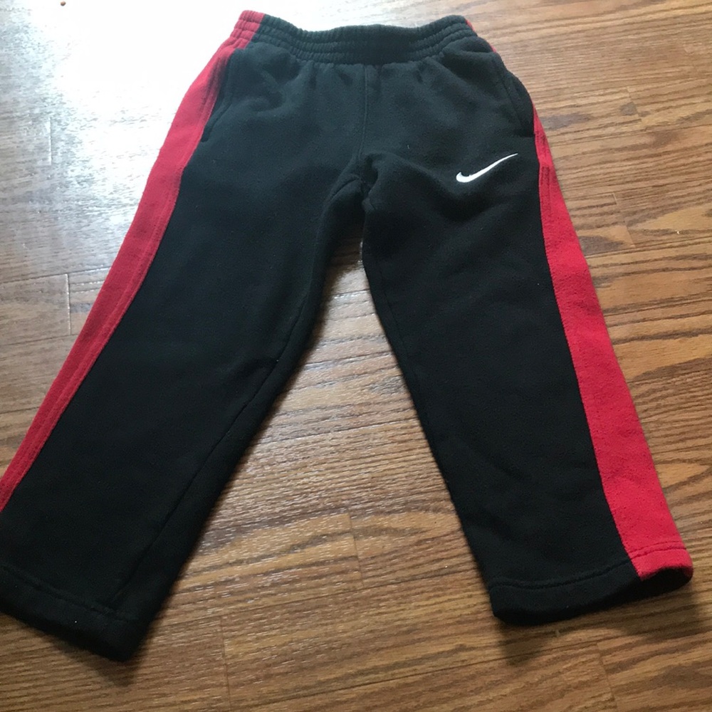Nike pants, size 4T black with red stripe